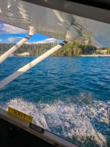 Floatplane Takeoff Cessna floatplane taking off on a lake, Whitehorse