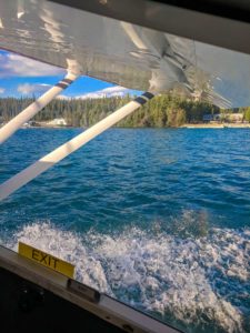 Cessna floatplane taking off on a lake, Whitehorse